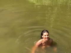'Kendall J.' topless in lake, short clip