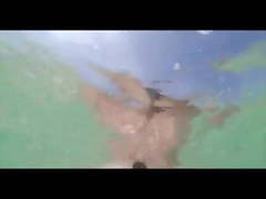 Bottle Insertion In Ocean at Beach